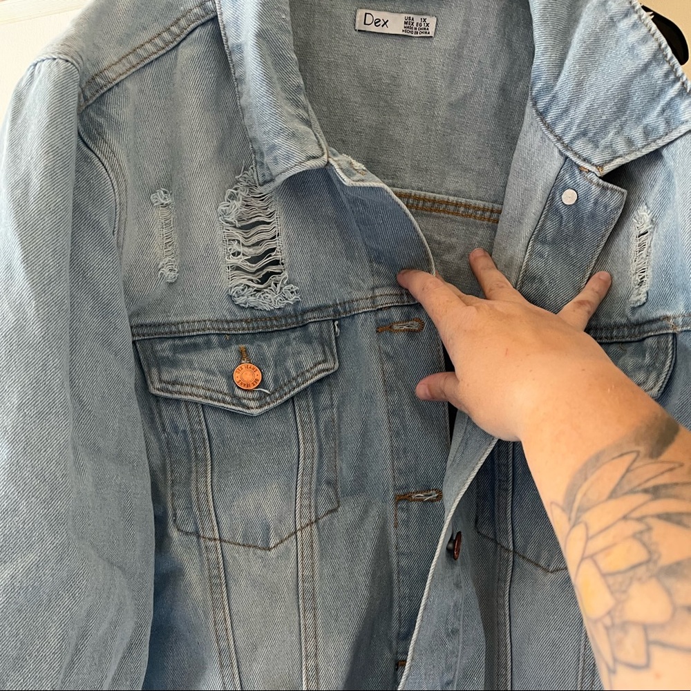 Distressed denim jacket